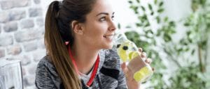 Woman drinking a healthy beverage