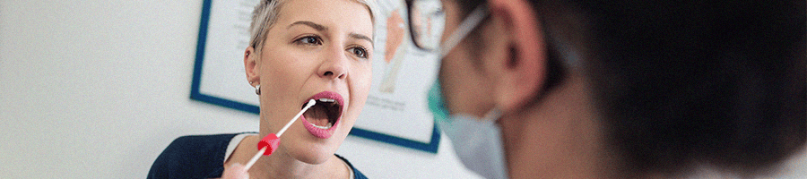 A female patient doing a swab test 