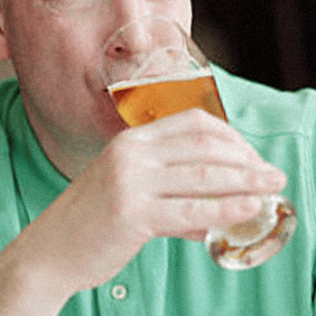 Man drinking apple cider vinegar