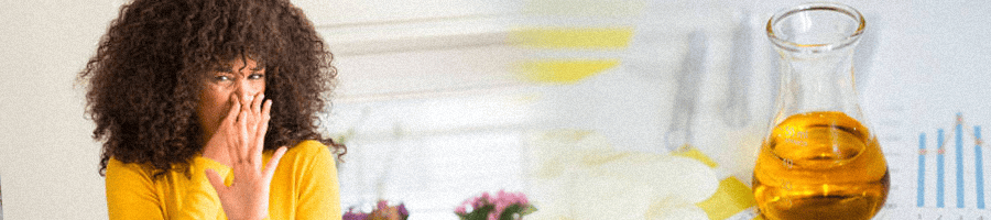 A person covering her nose from a bad odor of expired fake urine