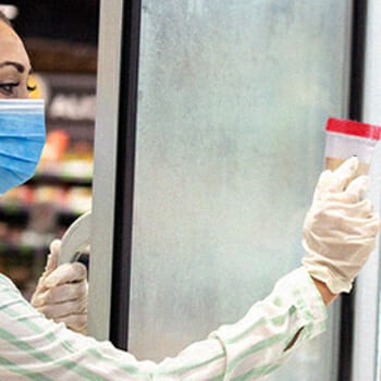 Woman looking at synthetic urine