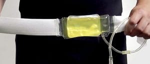 Synthetic urine belt being worn by someone
