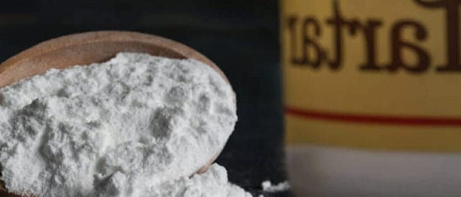 Tartar powder on spoon used in cream of tartar method