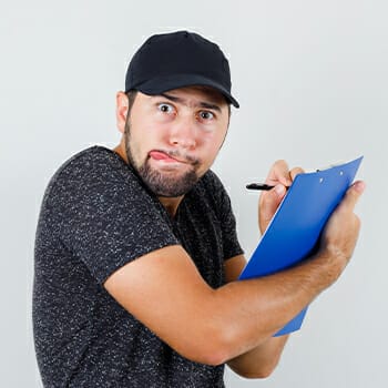 Man actively taking notes
