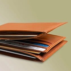 brown wallet with cards