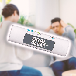 Oral clear gum in the foreground with a doctor and a patient in the background