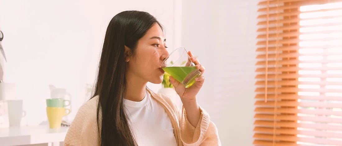 Do Detox Drinks Work for Meth? (What We Found!) A woman drinking a detox drink to flush out meth