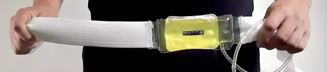 An image of a person holding a synthetic urine belt alternative