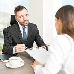 Employer and applicant discussing the pre-employment drug testing