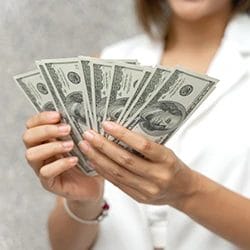 A woman counting her money